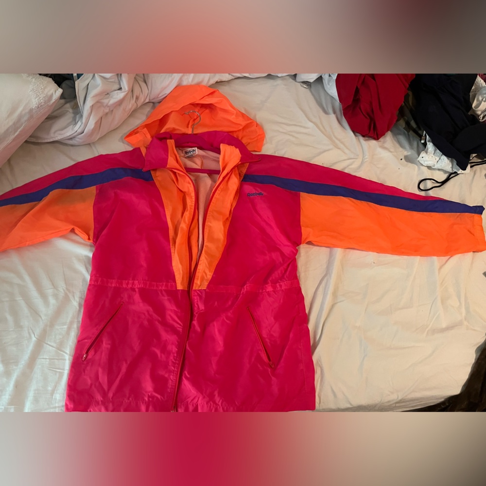 pink and orange rain jacket